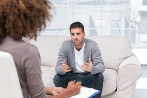 Counseling Schaumburg, IL- man sitting talking to counselor