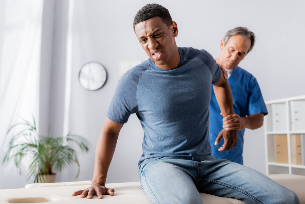 5 Surprising Situations That Chiropractic Care Can Help With - man on chiro table being adjusted